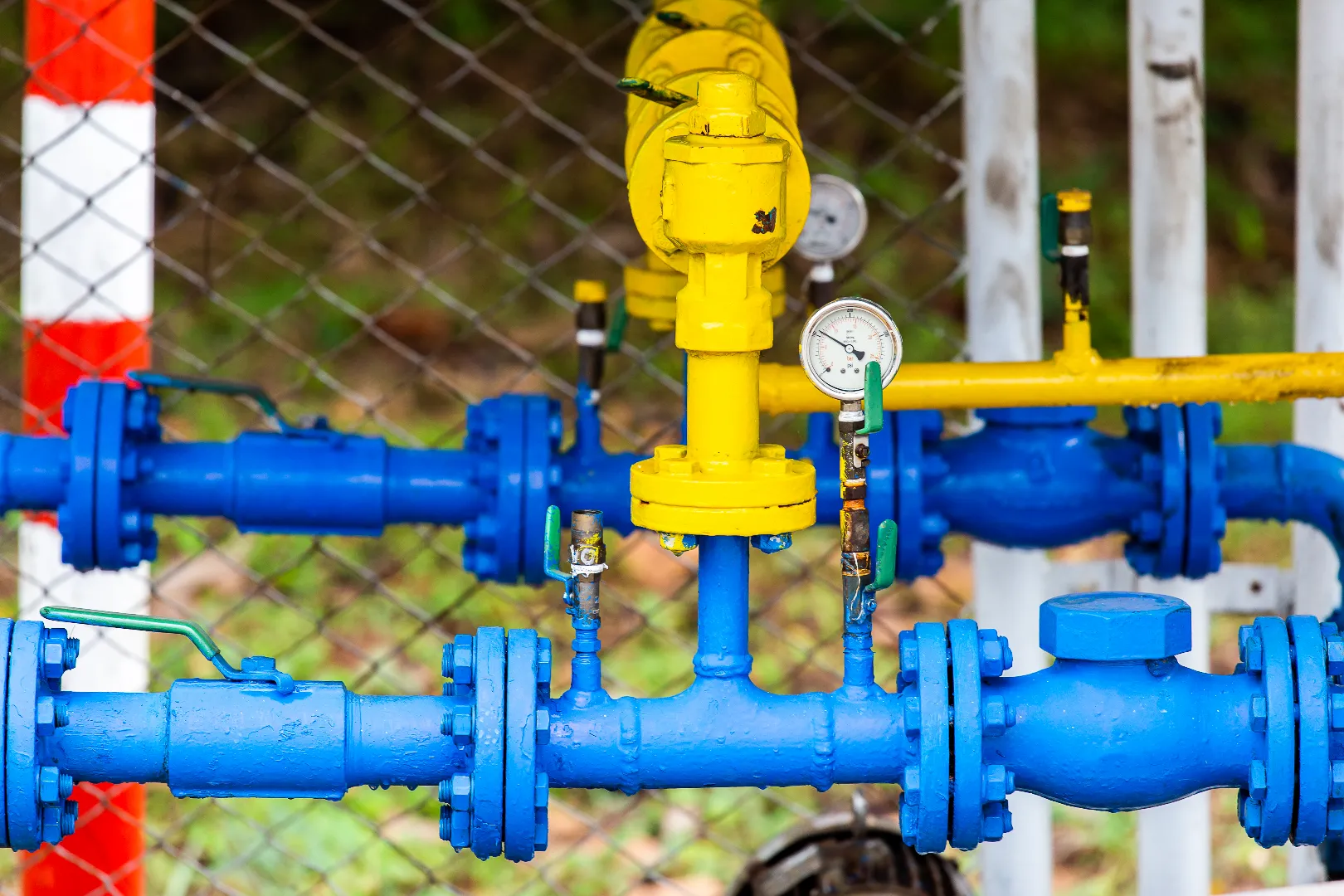 Gas line valves being serviced by licensed plumber in Caledon — professional gas service